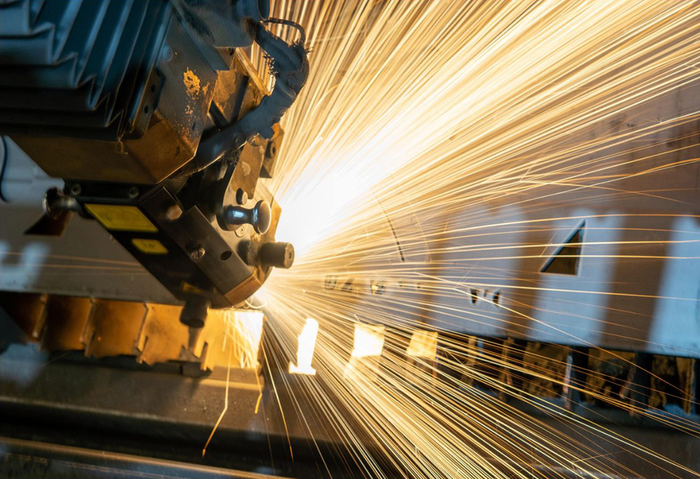 sparks flying out of a manufacturing machine